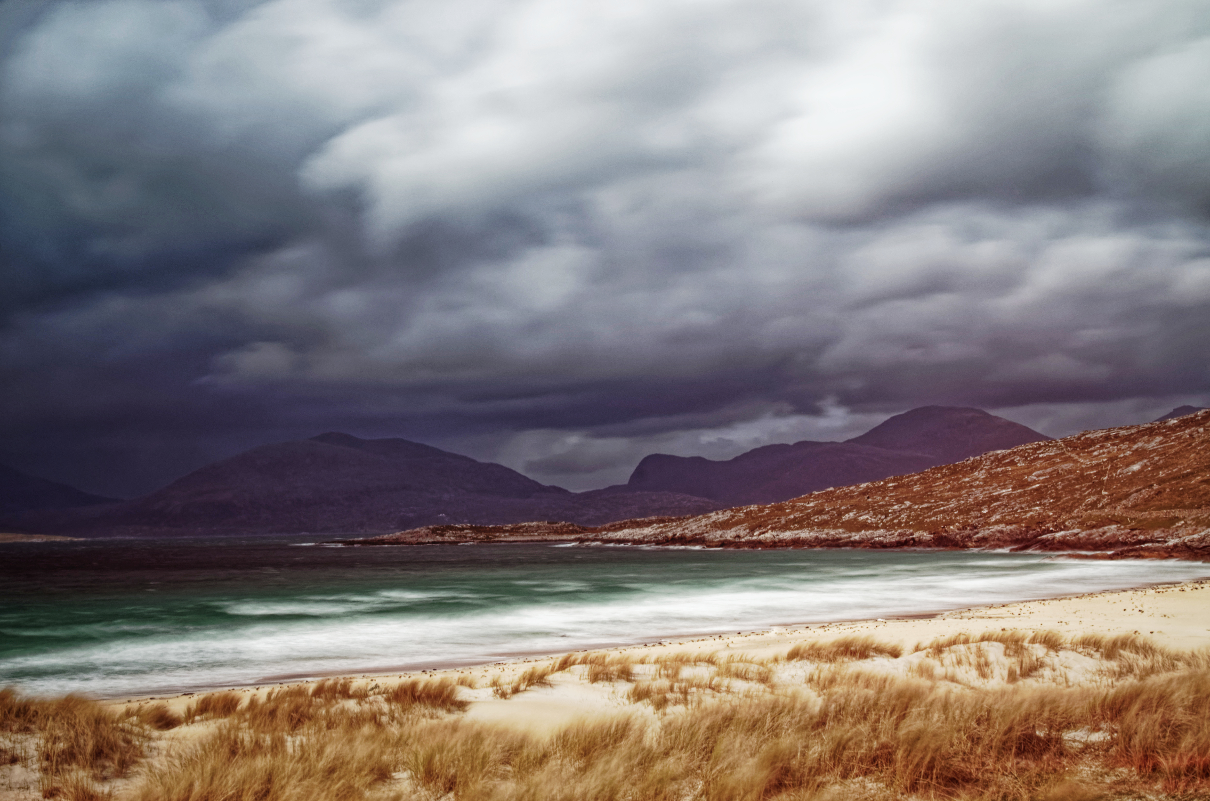 Image of coast and mountains as gale approaches Luskentyre