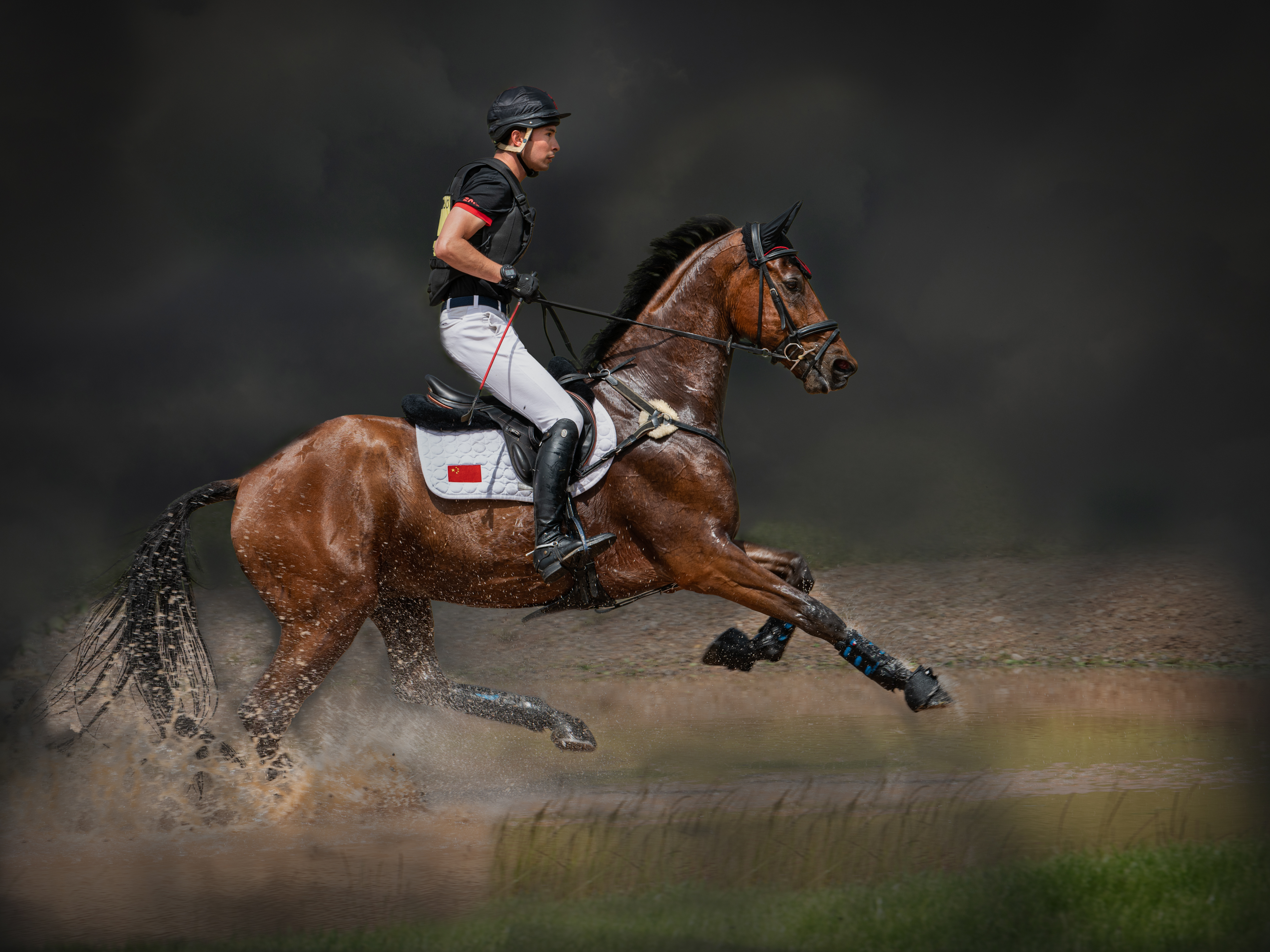 Chinese eventer Alex Hua Tian riding at Nunney