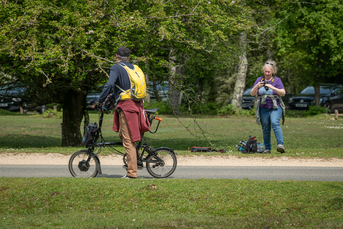 Amanda accosting a passing cyclist