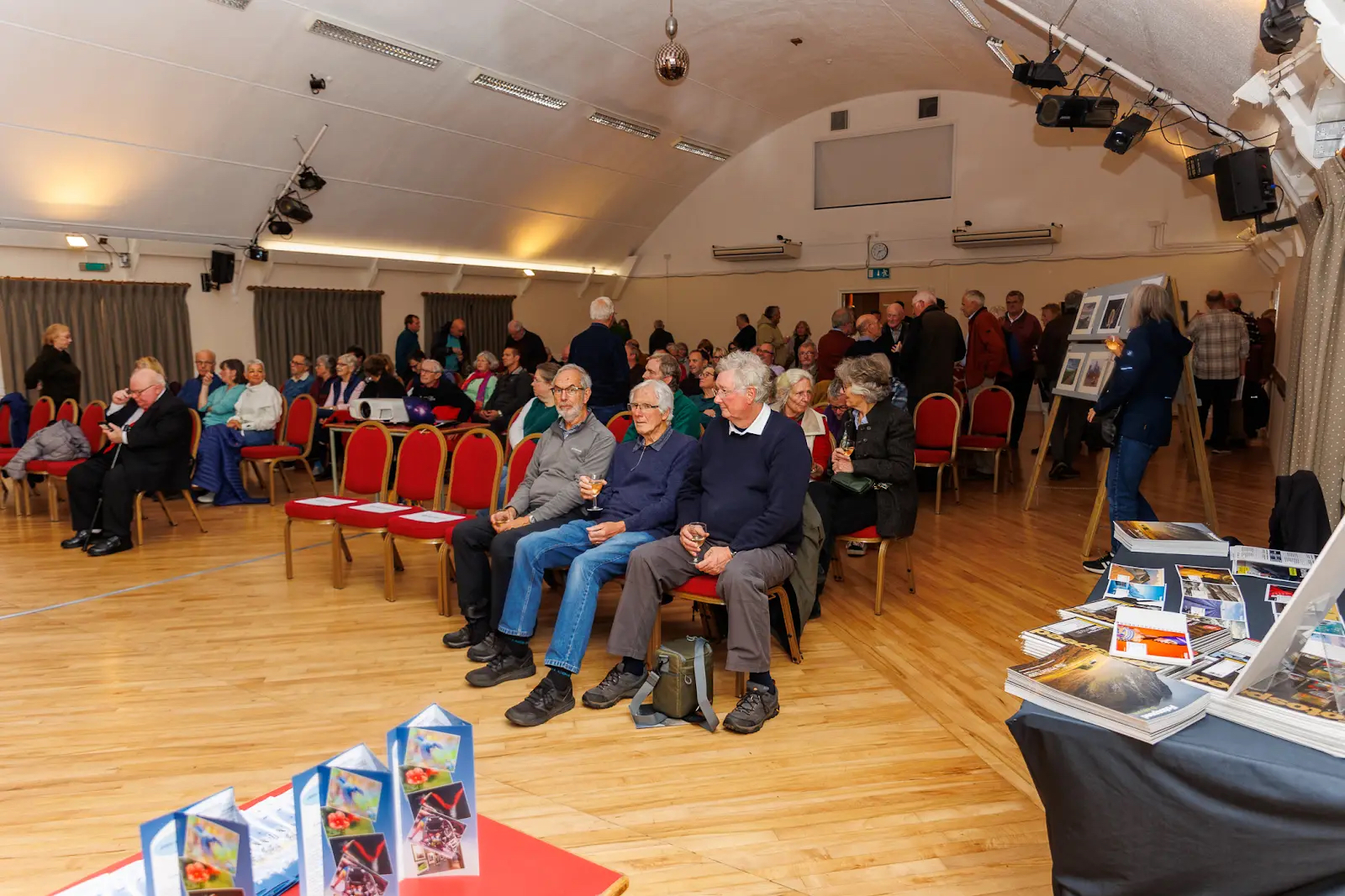 Photo of Memorial Hall filling with guests